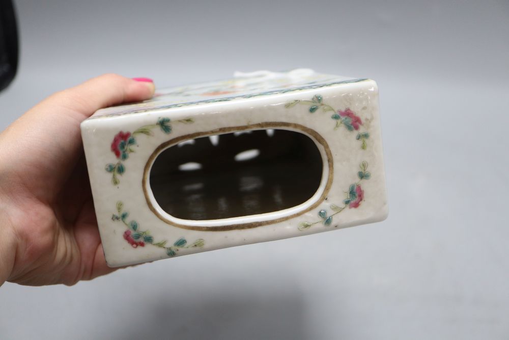 A Chinese famille rose pillow, late 19th century, height 15cm